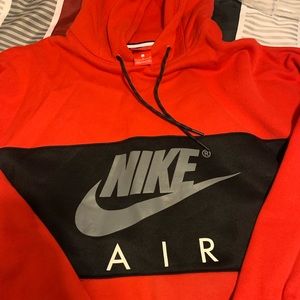 Large Nike Air hooded sweatshirt. Red and black. Has pockets.